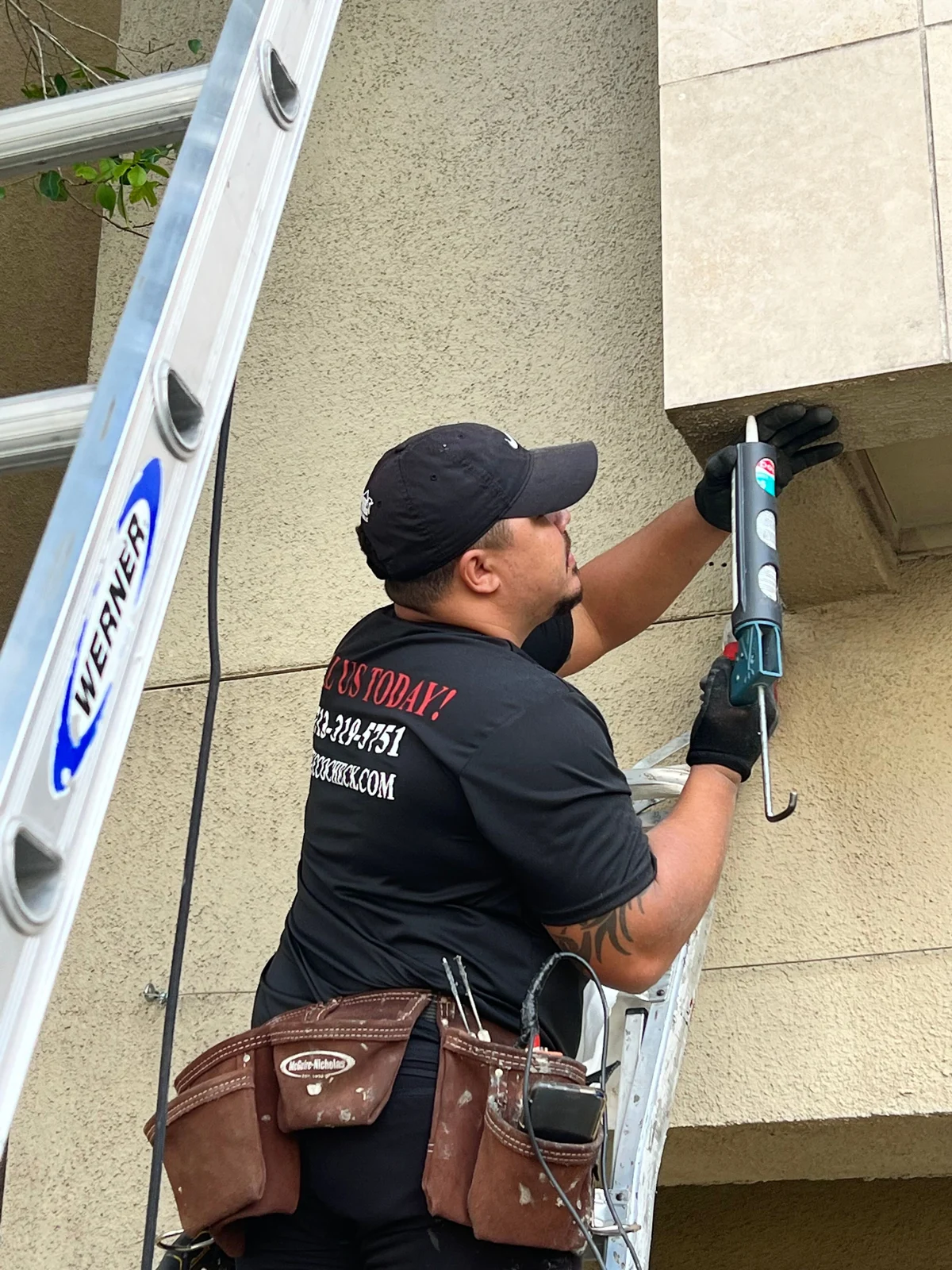 Stucco Check inspector applying sealant at an exterior inspection location